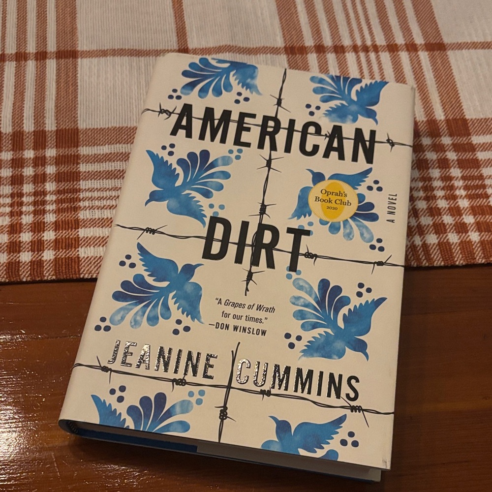 American Dirt Novel with Blue and White Cover
